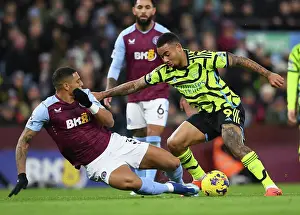 Aston Villa V Arsenal 2023-24 Prints: Gabriel Jesus vs Diego Carlos: Intense Battle at Villa Park - Aston Villa vs Arsenal FC