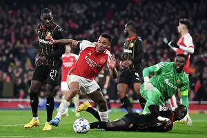 Arsenal V RC Lens 2023-24 Prints: Gabriel Jesus vs. Massadio Haidara: A Champions League Battle at Arsenal's Emirates Stadium