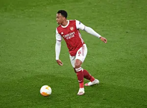 Gabriel Magalhaes: Arsenal's Unyielding Defender in Empty Emirates Stadium during Europa League Clash against Olympiacos