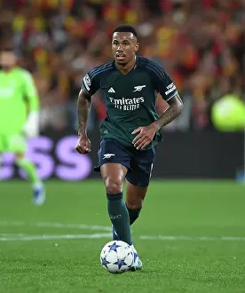 RC Lens V Arsenal 2023-24 Prints: Gabriel Magalhaes: Arsenal's Unyielding Defender in RC Lens Champions League Showdown