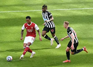 Newcastle United V Arsenal 2020-21 Prints: Gabriel Magalhaes Faces Pressure from Allan Saint-Maximin