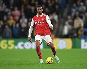 Wolverhampton Wanderers V Arsenal 2022-23 Prints: Gabriel Magalhaes Focuses in Arsenal's Battle at Molineux: Wolverhampton Wanderers vs Arsenal FC
