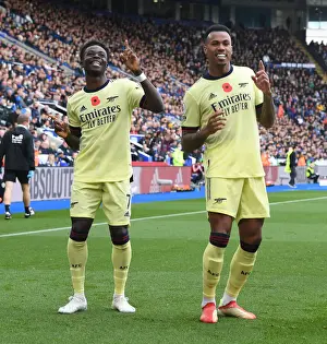 Gabriel and Saka Celebrate Arsenal's First Goal Against Leicester City (2021-22)