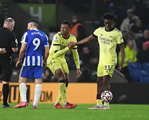 Gabriel and Sambi of Arsenal in Action against Brighton & Hove Albion (2021-22)