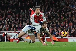 Arsenal V West Bromwich Albion 2016-17 Prints: Gabriel vs. Craig Dawson: Intense Battle at the Emirates