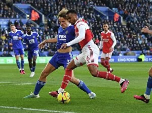 Images Dated 25th February 2023: Gabriel vs Faes: Clash of the Titans - Leicester City vs Arsenal FC, Premier League 2022-23