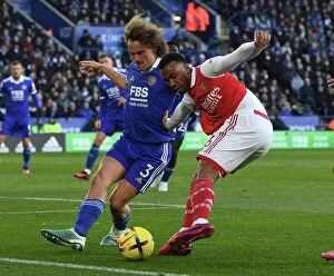 Images Dated 25th February 2023: Gabriel vs Faes: A Football Showdown at The King Power Stadium - Leicester City vs Arsenal FC