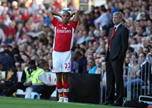 Gael Clichy (Arsenal) and Arsene Wenger the Arsenal Manager