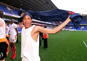 Gael Clichy (Arsenal) celebrates winning the league