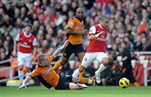 Images Dated 12th February 2011: Gael Clichy (Arsenal) Jamie O Hara (Wolves). Arsenal 2: 0 Wolverhampton Wanderers
