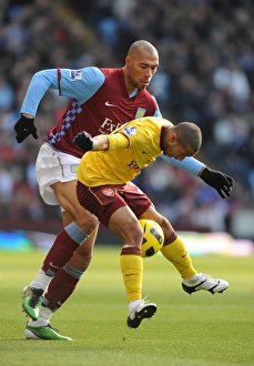 Aston Villa v Arsenal 2010-11 Gallery: Gael Clichy (Arsenal) John Carew (Villa). Aston Villa 2: 4 Arsenal. Barclays Premier League