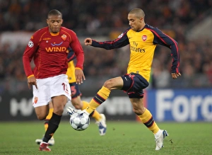 Gael Clichy (Arsenal) Julio Baptista (Roma)