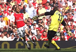Arsenal V Bolton 2006-7 Prints: Gael Clichy (Arsenal) Jussi Jskelainen (Bolton)