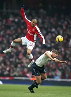 Images Dated 10th January 2009: Gael Clichy (Arsenal) Kevin Davis (Bolton)