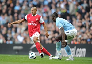 Manchester City v Arsenal 2010-11 Collection: Gael Clichy (Arsenal) Micah Richards (Man City). Manchester City 0: 3 Arsenal