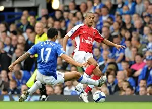 Images Dated 15th August 2009: Gael Clichy (Arsenal) Tim Cahill (Everton)