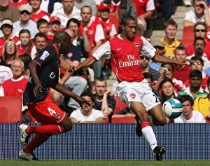 Arsenal V Paris Saint Germain 2007-08 Prints: Gael Clichy (Arsenal) Youssuf Mulumbu (PSG)