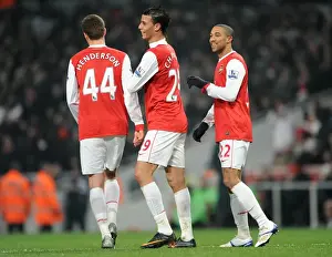 Gael Clichy celebrates scoring Arsenals 5th goal with Conor Henderson