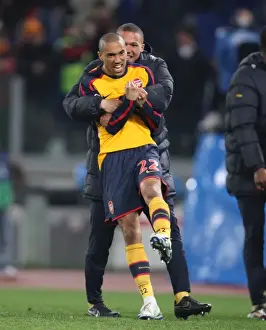 Gael Clichy and Kieran Gibbs celebrate Arsenal winning