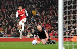 Gael Clichy scores Arsenals 5th goal past Goalkeeper Jamie Jones and under pressure from Andrew Whing (Orient). Arsenal 5: 0 Leyton Orient. FA Cup 5th Round Replay. Emirates Stadium, 2 / 3 / 11. Credit : Arsenal Football Club /
