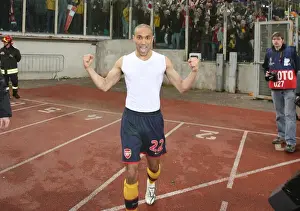 AS Roma V Arsenal 2008-9 Prints: Gael Clichy's Euphoric Moment: Arsenal's Penalty Shootout Victory over AS Roma in the UEFA Champions League