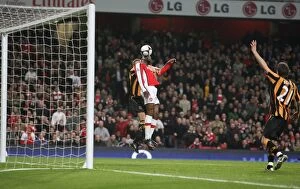 Arsenal v Hull City FA Cup Collection: Gallas Soars Over Dawson: Arsenal's FA Cup Goal
