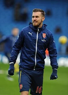 Images Dated 18th January 2015: Gearing Up for Battle: Aaron Ramsey's Focus before Manchester City vs Arsenal