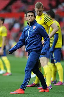 Manchester United V Arsenal 2014-15 Prints: Gearing Up for Battle: Alexis Sanchez Prepares for Manchester United vs Arsenal