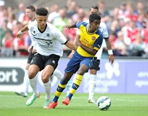 Images Dated 19th July 2014: Gedion Zelalem vs. Lee Angol: Battle in the Pre-Season Friendly between Boreham Wood and Arsenal