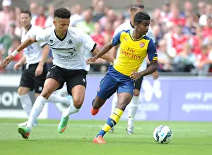 Boreham Wood V Arsenal Prints: Gedion Zelalem vs. Lee Angol: Clash in Arsenal's Pre-Season Friendly against Boreham Wood