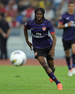 Malaysia XI V Arsenal 2012-13 Prints: Gervinho in Action: Arsenal vs Malaysia XI (2012)