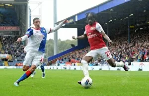 Images Dated 17th September 2011: Gervinho (Arsenal) Jason Lowe (Blackburn). Blackburn Rovers 4: 3 Arsenal