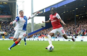 Blackburn Rovers v Arsenal 2011-12 Collection: Gervinho (Arsenal) Jason Lowe (Blackburn). Blackburn Rovers 4: 3 Arsenal