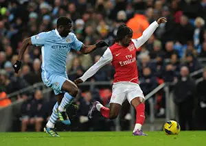 Manchester City V Arsenal 2011-12 Prints: Gervinho Dashes Past Kolo Toure: Manchester City vs