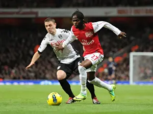 Arsenal V Fulham 2011-12 Prints: Gervinho outmaneuvers Chris Baird in Arsenal's Premier League Clash (2011-12)