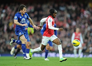 Arsenal V Everton 2011-12 Prints: Gervinho Outmaneuvers Leighton Baines in Arsenal vs. Everton Premier League Clash