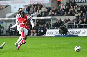 Swansea City V Arsenal 2012-13 Prints: Gervinho Scores Against Angel Rangel: A Premier League Goal Clash between Swansea City and Arsenal