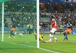 Montpellier V Arsenal 2012-13 Prints: Gervinho Scores Past Jourden: Montpellier vs. Arsenal, UEFA Champions League 2012