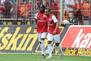 Gervinho and Theo Walcott Celebrate Arsenal's Goals in Cologne Friendly