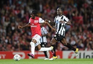 Arsenal v Udinese 2011-12 Collection: Gervinho vs. Agyemang-Badu: A Battle of Wits at the Emirates - Arsenal vs