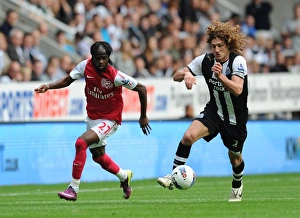 Newcastle United V Arsenal 2011-12 Prints: Gervinho vs. Coloccini: Battle at St