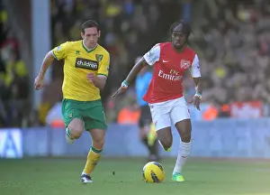Norwich City V Arsenal 2011-12 Prints: Gervinho vs. Crofts: A Premier League Battle at Carrow Road