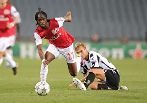 Udinese V Arsenal 2011-12 Prints: Gervinho vs. Ekstrand: Arsenal's Edge in Udinese Clash (2011-12)