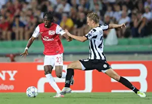 Udinese V Arsenal 2011-12 Prints: Gervinho vs. Ekstrand: Battle at the Stadio Friuli - Udinese vs