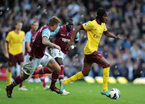 West Ham United V Arsenal 2012-13 Prints: Gervinho vs. George McCartney: A Battle in the 2012-13 Premier League Clash Between West Ham and Arsenal