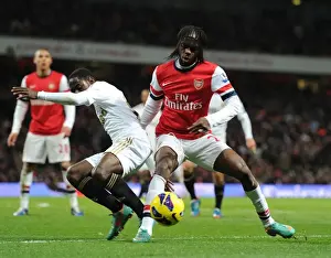 Arsenal V Swansea 2012-13 Prints: Gervinho vs. Nathan Dyer: Intense Battle at the Emirates - Arsenal v Swansea City