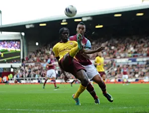 West Ham United V Arsenal 2012-13 Prints: Gervinho vs. Winston Reid: Intense Battle at the Boleyn Ground - Arsenal vs