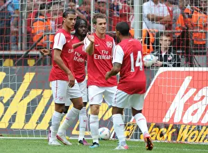 Cologne V Arsenal Prints: Gervinho's Brace: Arsenal Celebrates Double Delight Against Cologne