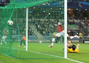 Montpellier V Arsenal 2012-13 Prints: Gervinho's Game-Changing Goal: Arsenal's Victory Over Montpellier in the UEFA Champions League