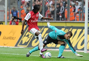 Cologne V Arsenal Prints: Gervinho's Shot Saved by Rensing in Cologne Friendly